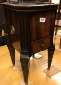 A 19th Century mahogany wine cooler, the plain top enclosing a tin liner,