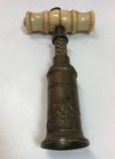 A 19th Century Thomason type brass barrel king screw with double helix and ivory handle (brush