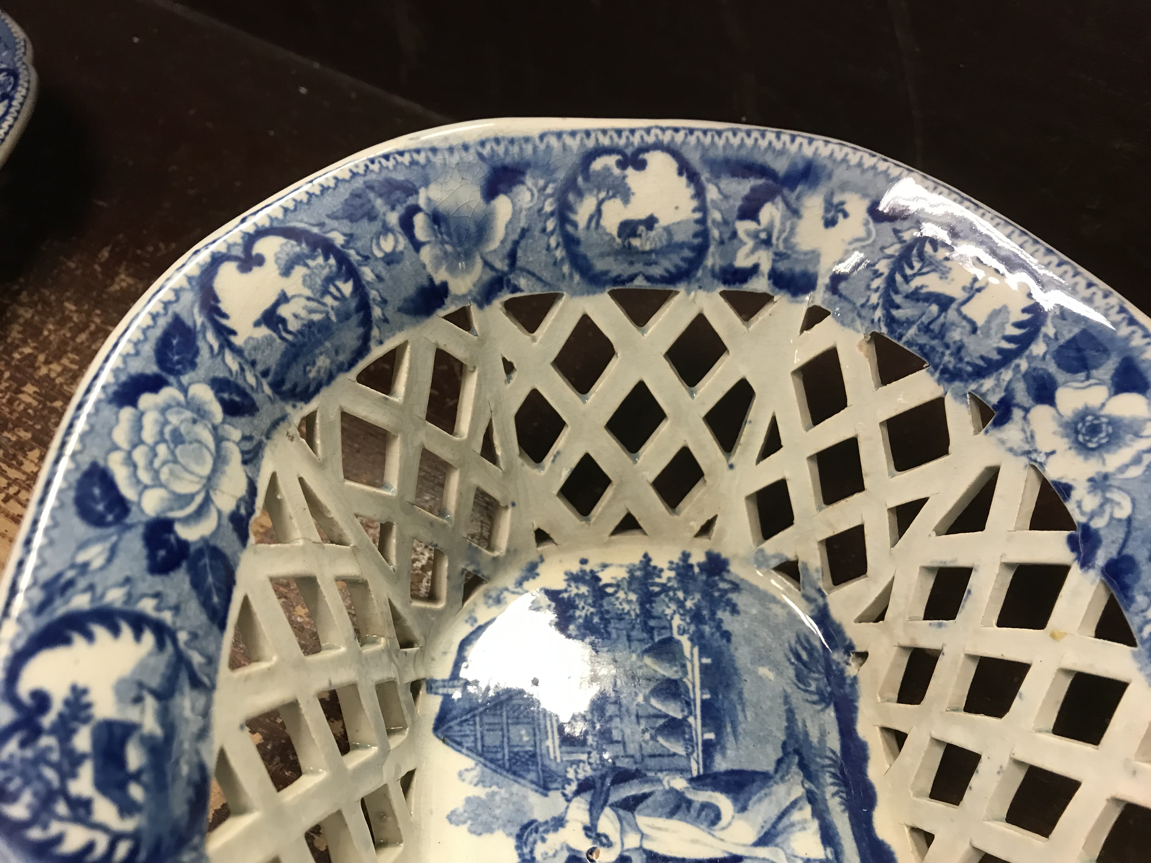 An early 19th Century blue and white transfer decorated pottery chestnut basket and stand, - Image 17 of 35