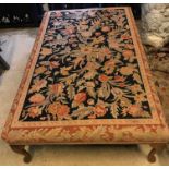 A modern floral tapestry upholstered rectangular drawing room stool on beech cabriole legs to pad