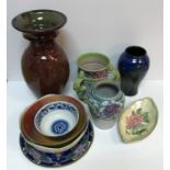 A collection of various china wares to include a Charlotte Rhead Crown Ducal vase with three