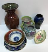 A collection of various china wares to include a Charlotte Rhead Crown Ducal vase with three