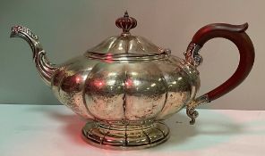 A Birks sterling silver teapot in the form a squash with wooden handle and finial,