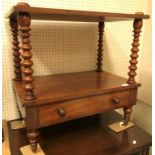 A Victorian mahogany whatnot of two tiers on bobbin turned supports with single drawer on turned