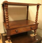 A Victorian mahogany whatnot of two tiers on bobbin turned supports with single drawer on turned