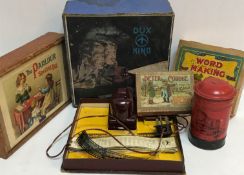 A collection of various vintage toys and games to include Dux Kino projector,