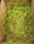 A collection of Webb pale green overlaid cut glass wines including eight with conical bowls and