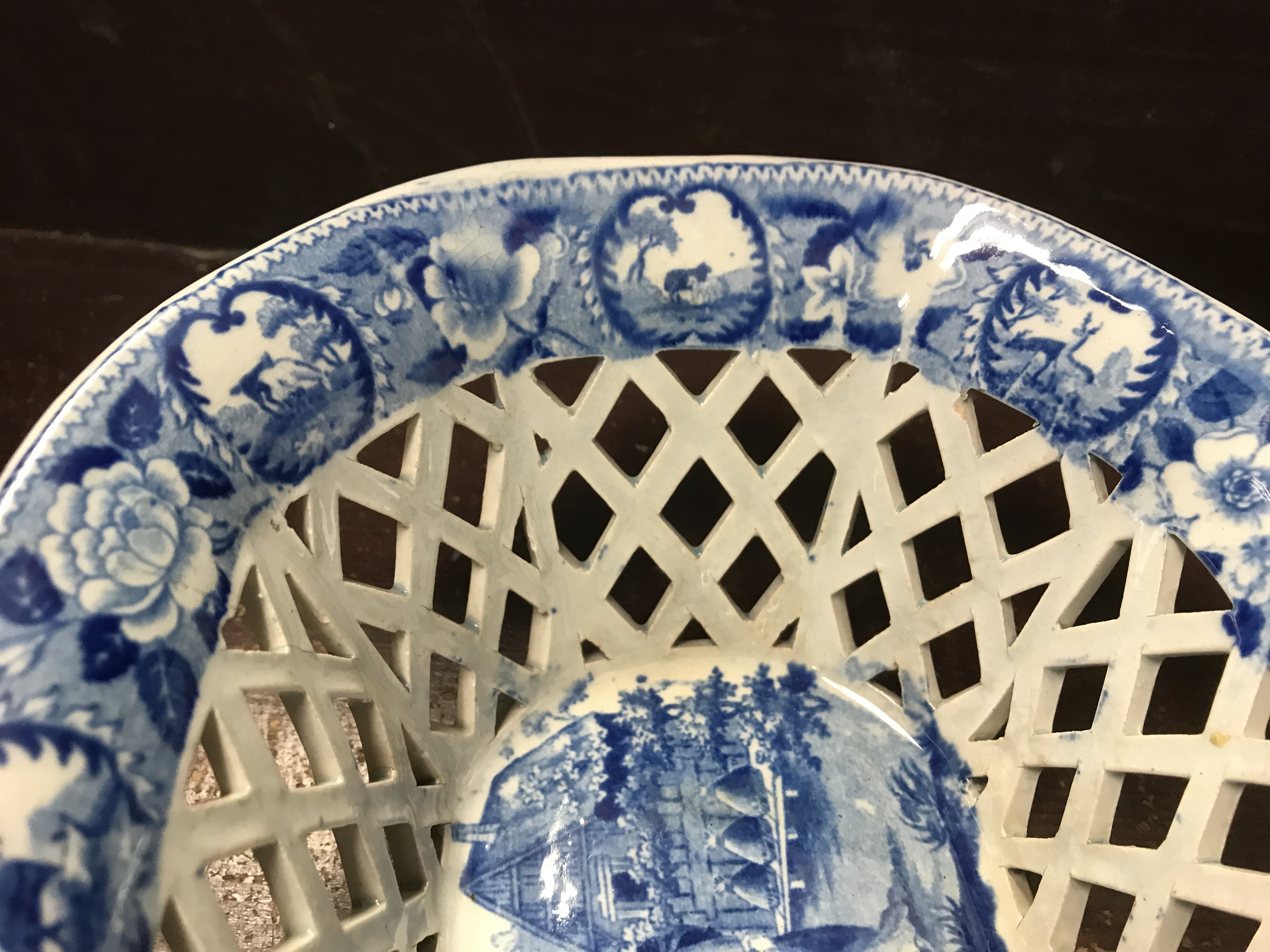 An early 19th Century blue and white transfer decorated pottery chestnut basket and stand, - Image 3 of 35