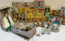 Two boxes of various vintage childrens' toys and games, including Sooty and Sweep glove puppets,