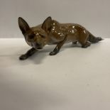 A Rosenthal figure of a fox by F Diller 29 cm long x 7 cm high CONDITION REPORTS In