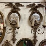 A pair of 20th Century giltwood wall lights in the Regency taste,