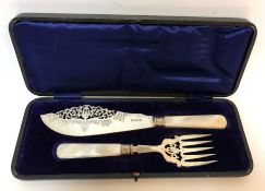 Two cased sets of six silver tea spoons (by Emile Viner,