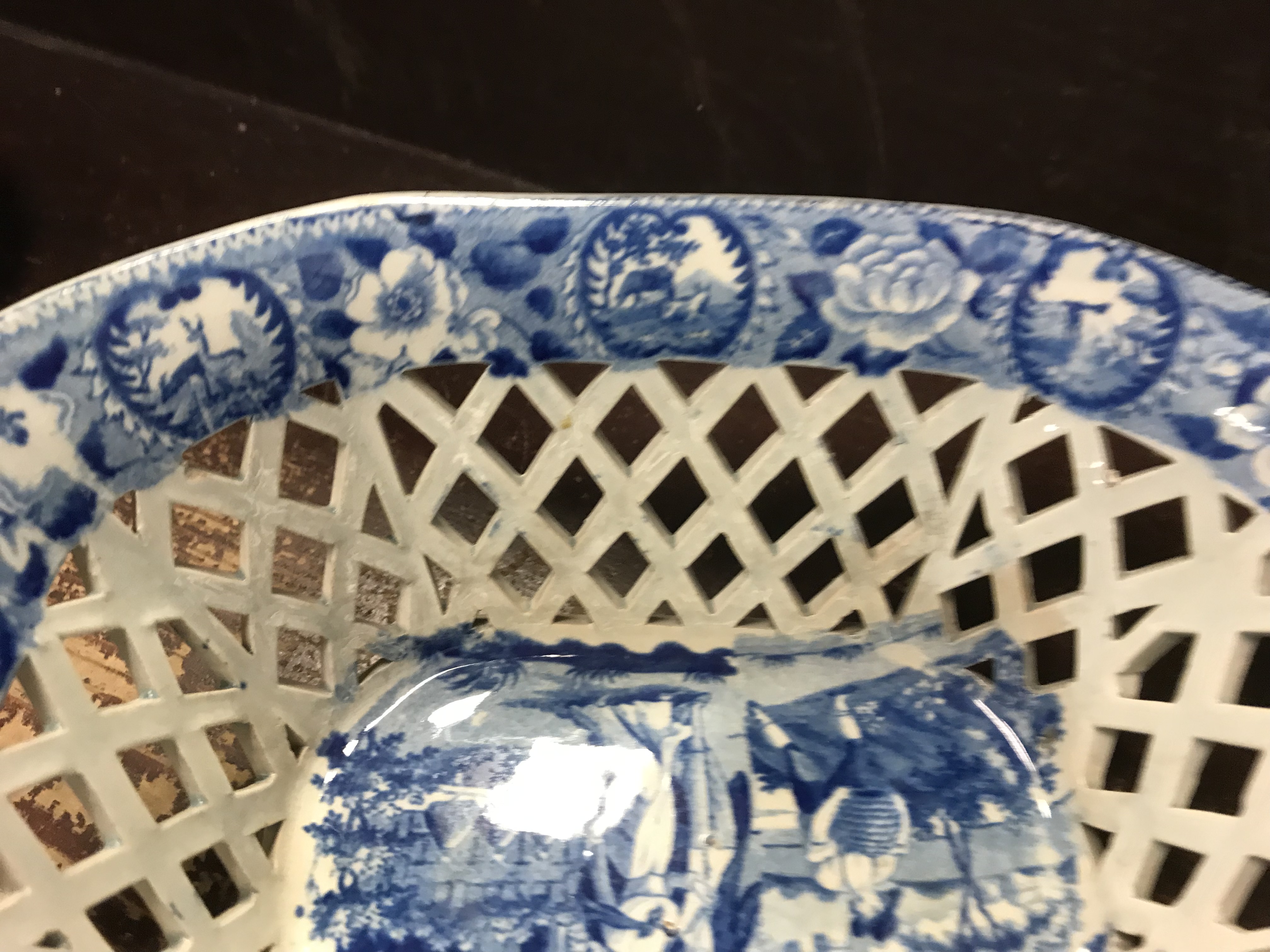 An early 19th Century blue and white transfer decorated pottery chestnut basket and stand, - Image 16 of 35