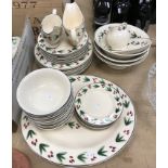 A collection of Emma Bridgwater "Rosehip" pattern dinner wares including two sauceboats and one