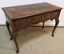 A walnut and feather-banded side table in the early 18th Century manner,