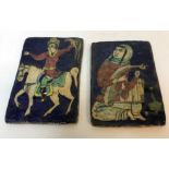 Two Quajar blue ground pottery tiles, one depicting a "Falconer on horseback", 21.