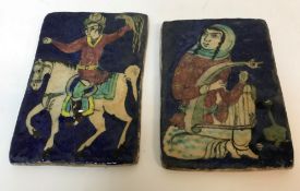 Two Quajar blue ground pottery tiles, one depicting a "Falconer on horseback", 21.