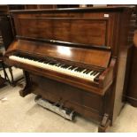 A circa 1900 rosewood cased upright piano, the iron framed straight strung movement No'd. "27584" by