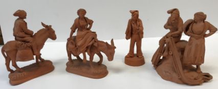 A group of four 20th Century Italian terracotta figures including "Fisherman mending net with fish