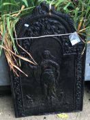 A cast iron fire back with Classical figure decoration, 57.5 cm wide x 91 cm high