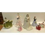 A collection of china figurines, including Royal Worcester "Her Majesty Queen Elizabeth II"