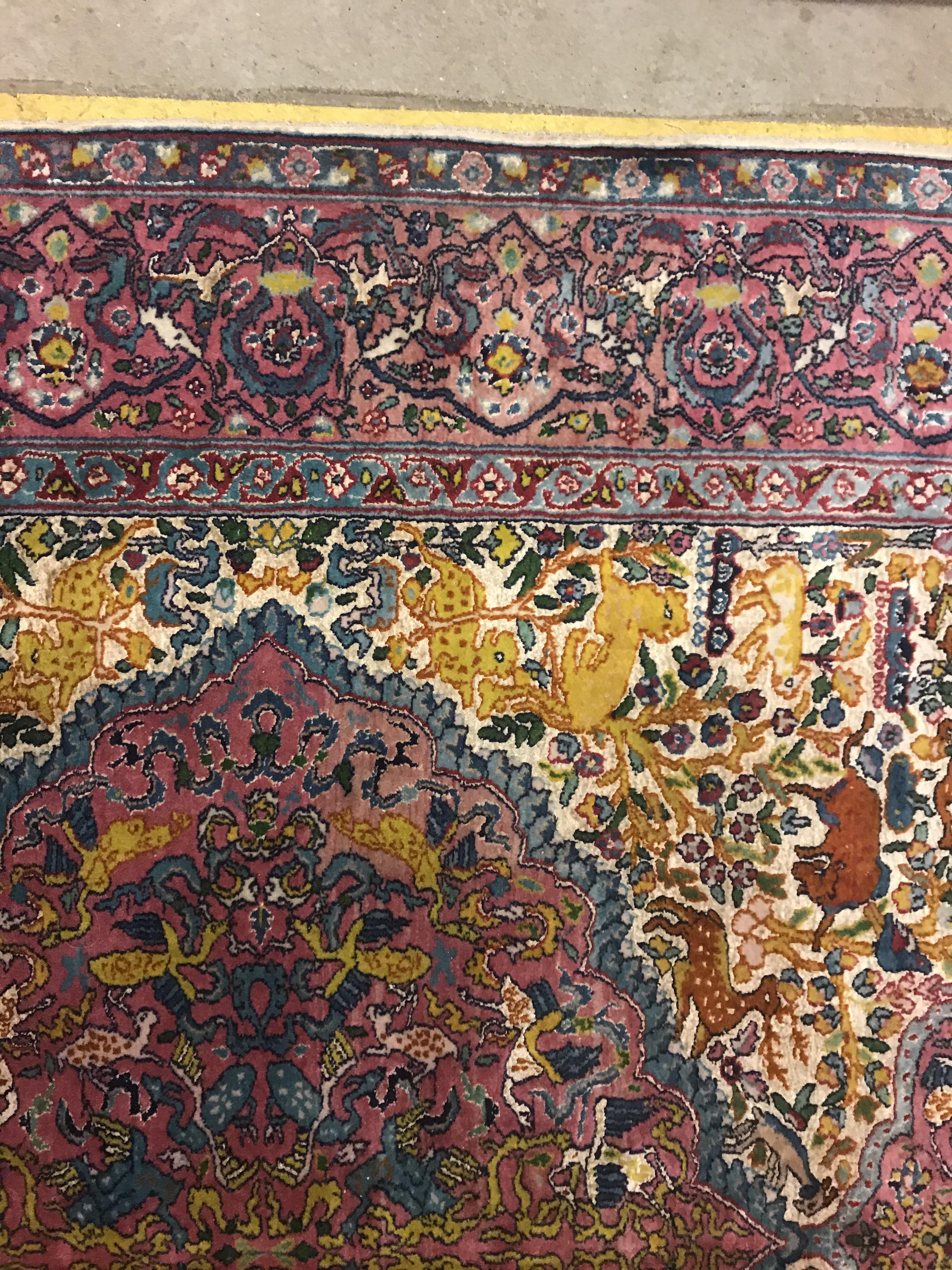 A mid 20th Century Tabriz rug, the central panel set with all-over animal and floral motifs on a - Image 6 of 14