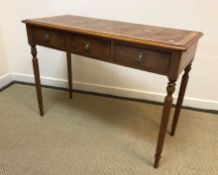 A burr elm hall table in the Regency style, the inlaid and cross-banded top with moulded edge over