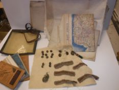A collection of militaria to include Women's Transport Service F.A.N.Y (First Aid Nursing