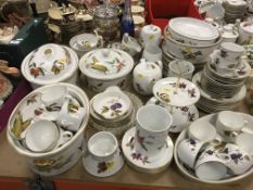 A collection of Royal Worcester "Evesham" pattern dinner and tea wares to include two oval