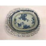 An 18th Century Chinese blue and white shaped rectangular platter with floral spray decoration to