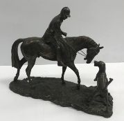 A cold cast bronze figure of "Huntsman on horseback with hound" AFTER A GEENTY, 33 cm long x 36.75