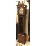 A modern mahogany cased long case clock, the ECS Westminster chimes German movement with brassed