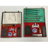 A modern Chinese calligraphy set with six brush pens, ink stone, pen rests, seal, etc, in fabric