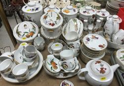 A large collection of Royal Worcester "Evesham" pattern dinner and kitchen wares including seven