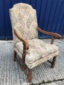An early 20th Century Swiss oak framed hall chair in the 18th Century manner, the upholstered back