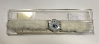 A circa 1995 Swatch "Seal" watch, the face inscribed "I heart u" with faux fur strap in Atlanta 1996