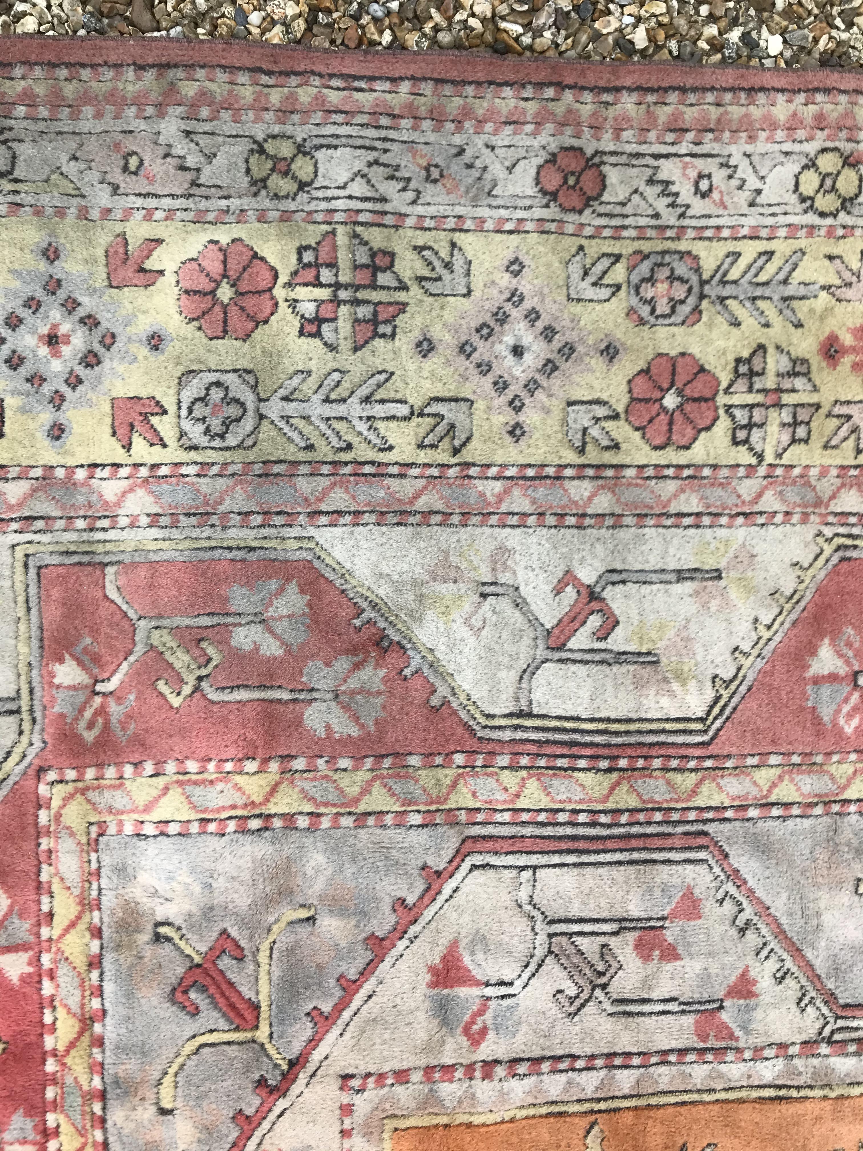 A Caucasian rug, the central panel set with three - Image 15 of 31