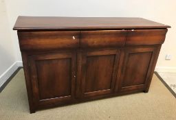 A modern cherry wood sideboard in the 19th Century