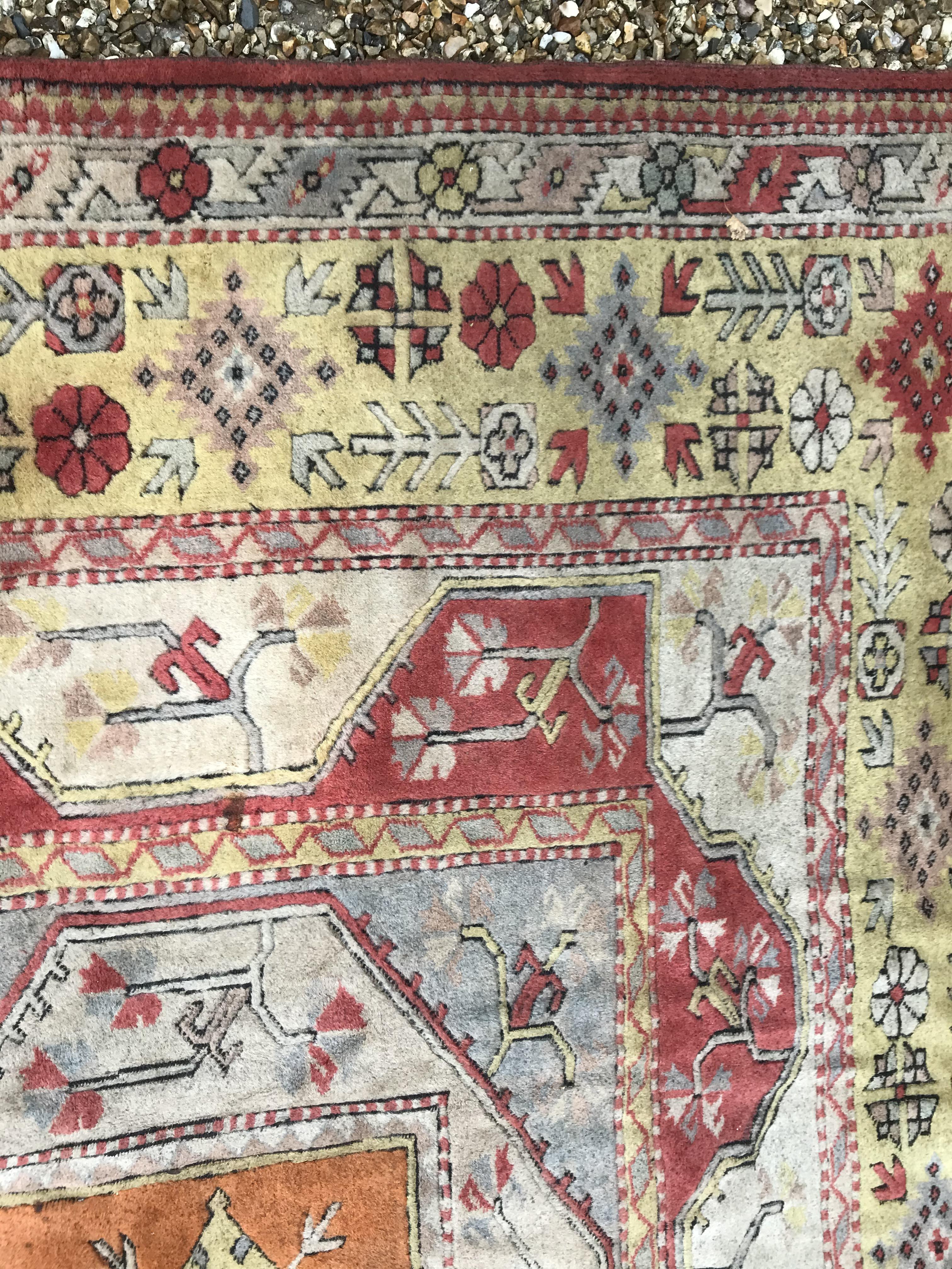 A Caucasian rug, the central panel set with three - Image 26 of 31