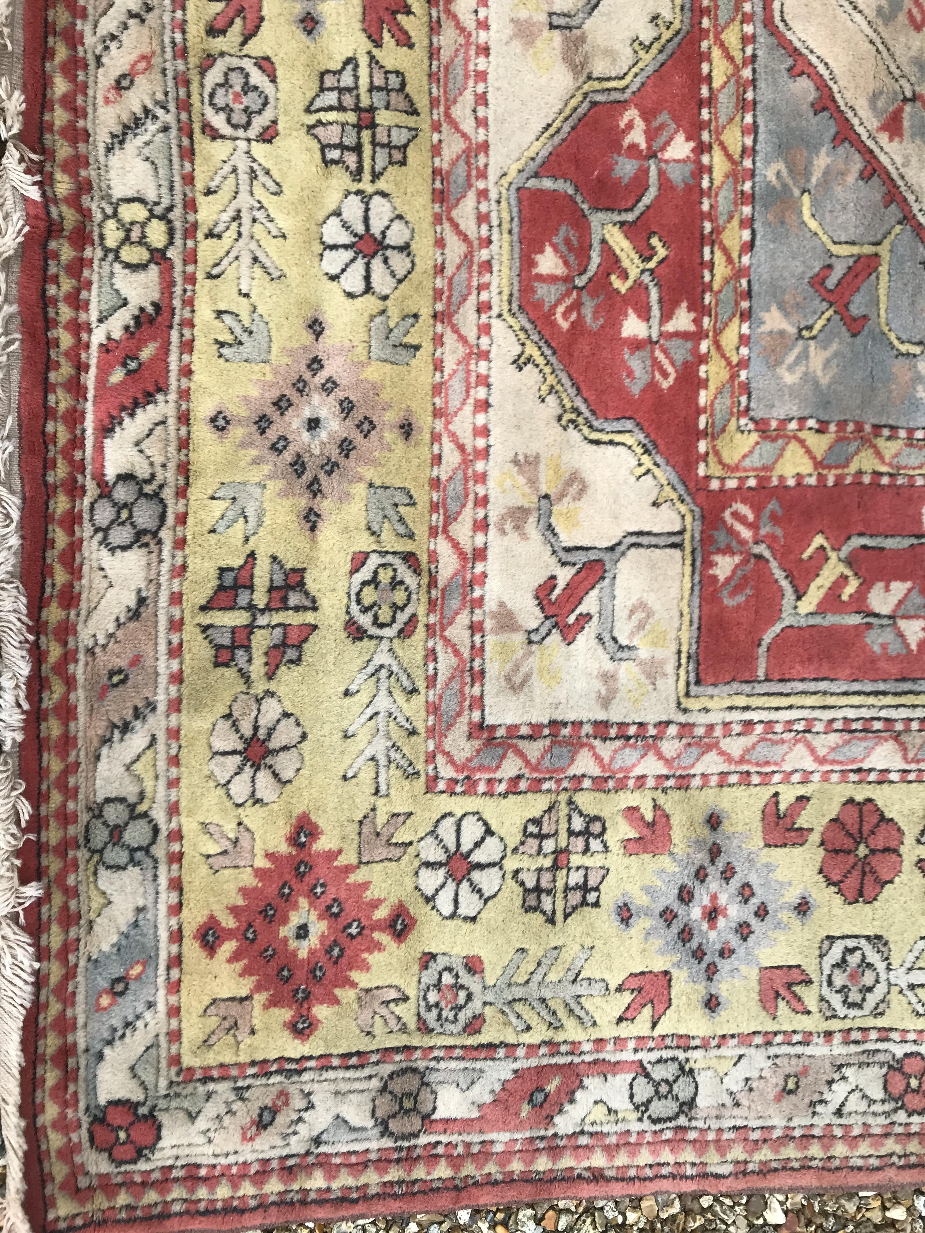 A Caucasian rug, the central panel set with three - Image 13 of 31