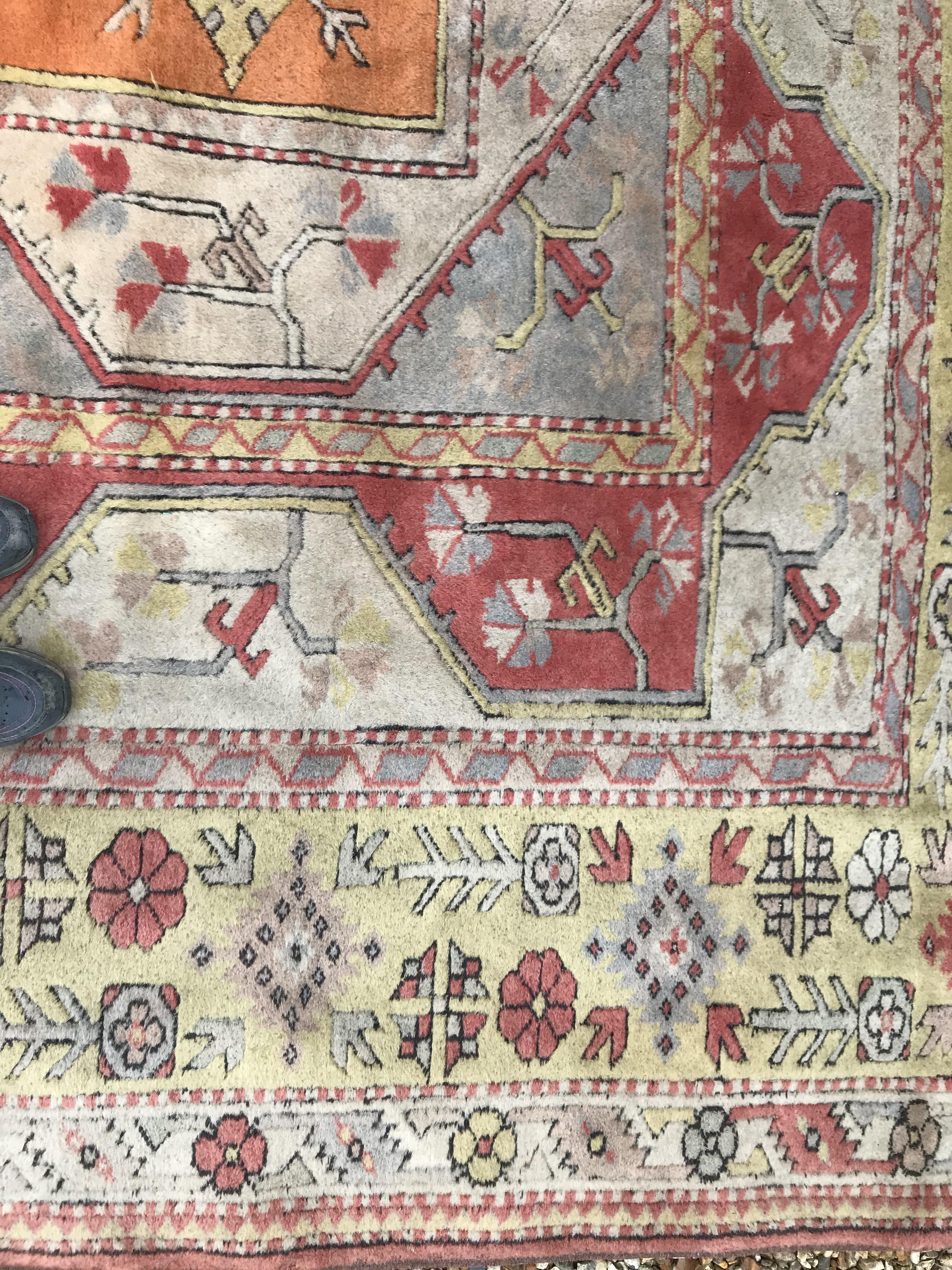 A Caucasian rug, the central panel set with three - Image 24 of 31