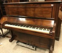 A circa 1900 rosewood cased upright piano, the iro