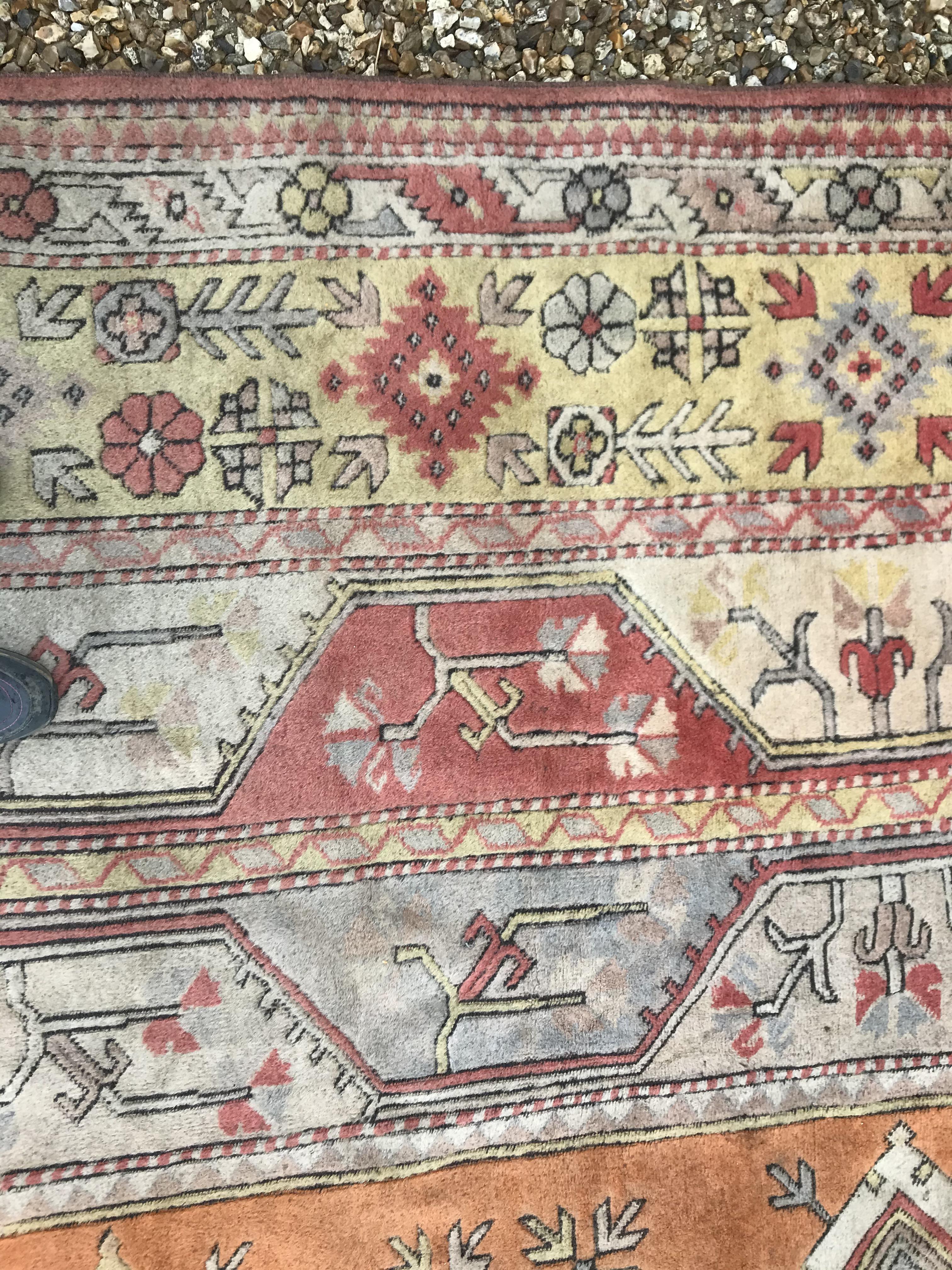 A Caucasian rug, the central panel set with three - Image 20 of 31