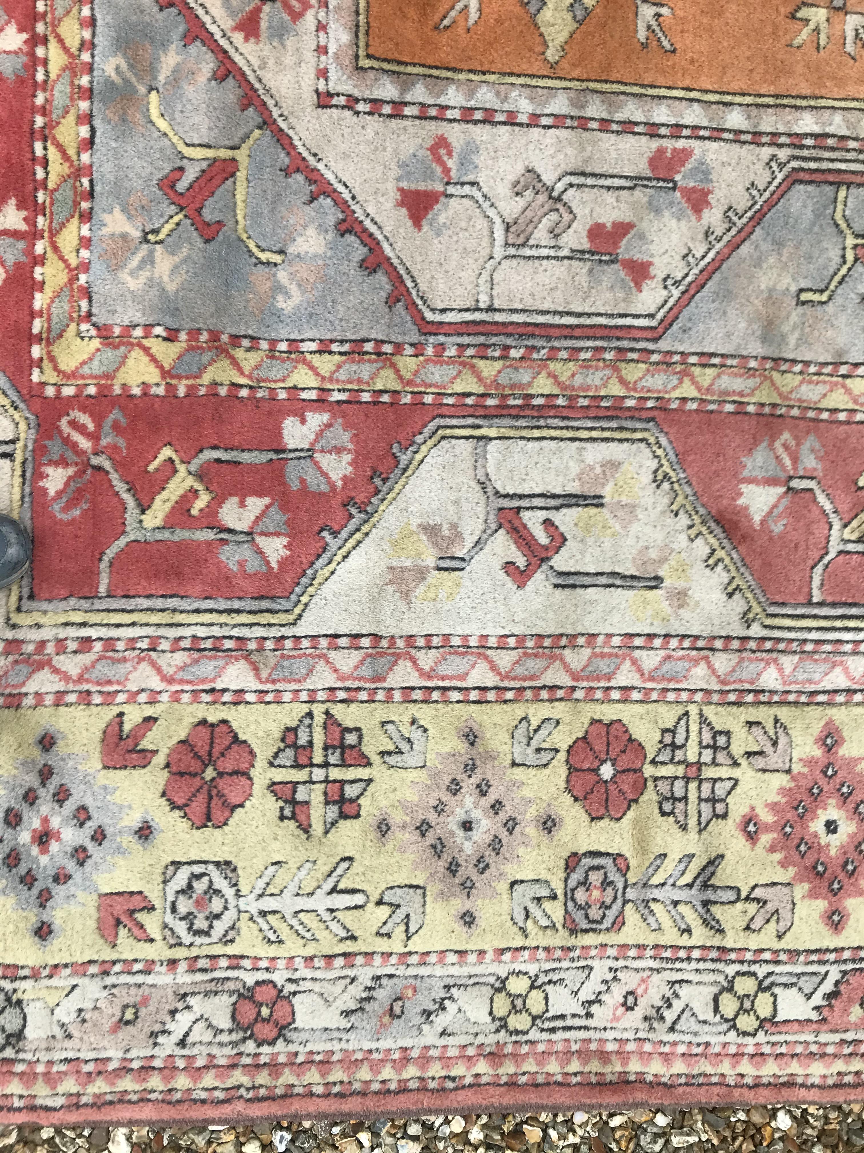 A Caucasian rug, the central panel set with three - Image 17 of 31