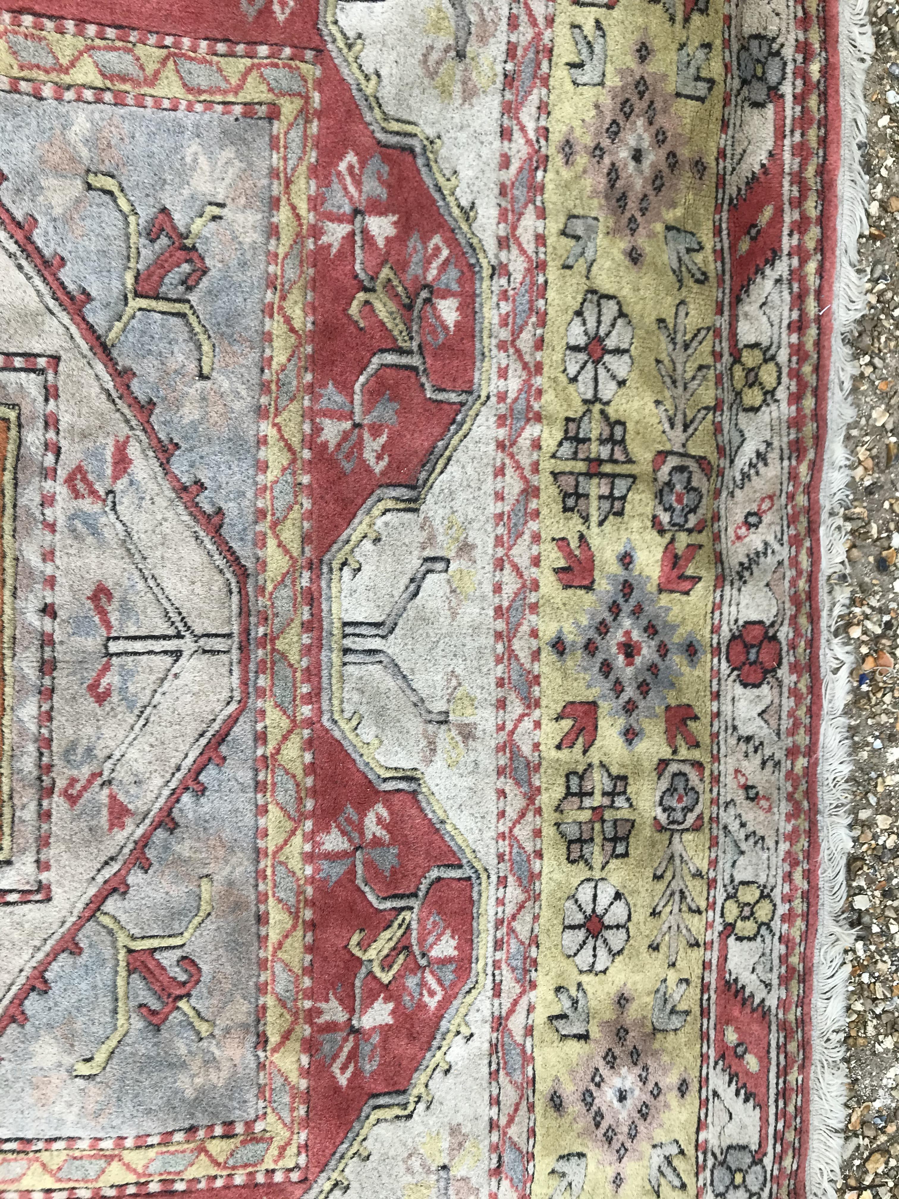 A Caucasian rug, the central panel set with three - Image 28 of 31