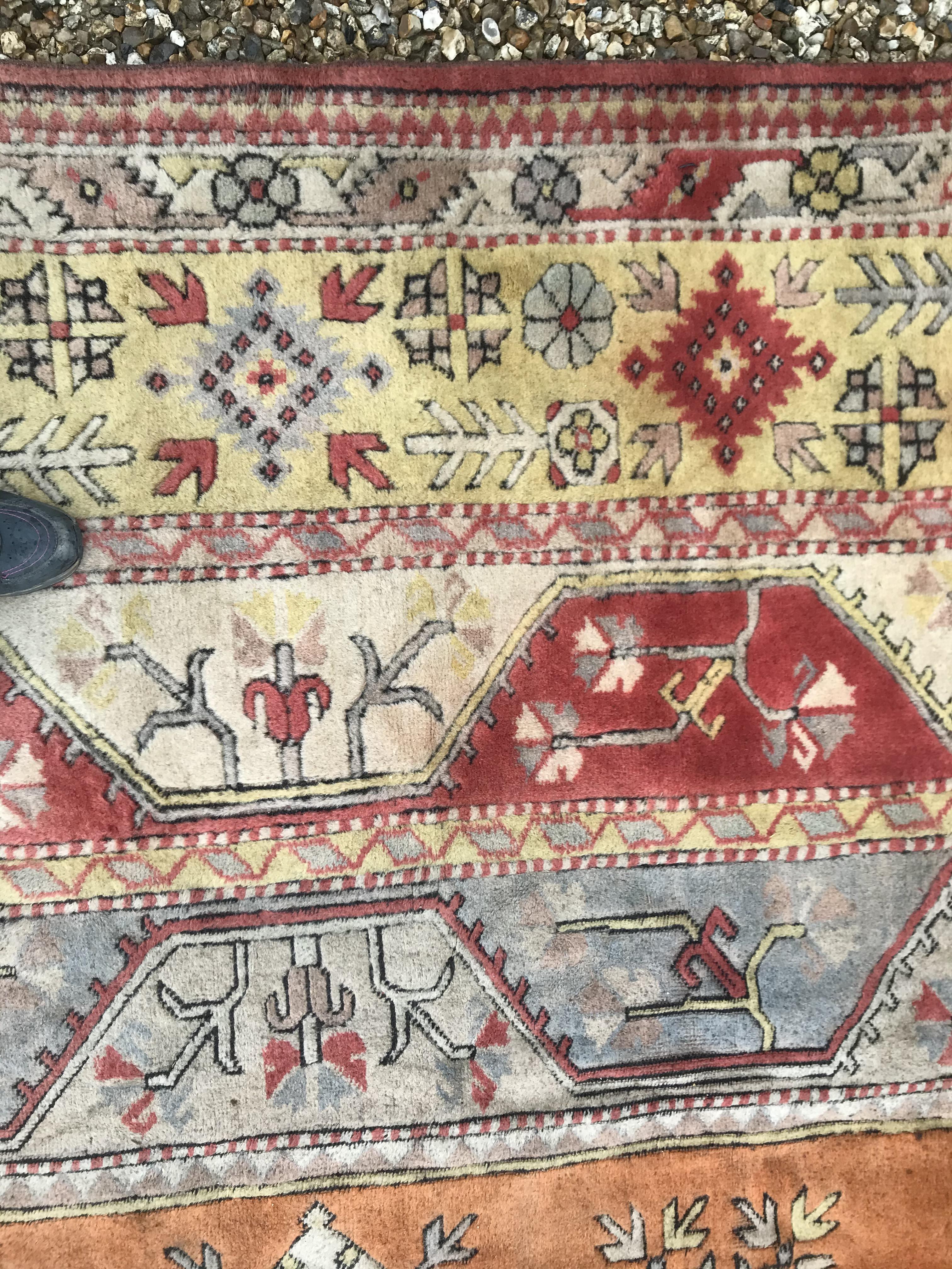 A Caucasian rug, the central panel set with three - Image 21 of 31