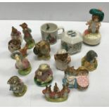 A collection of eleven Beatrix Potter figurines co