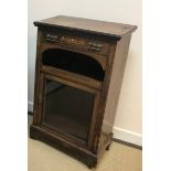 A Victorian rosewood and marquetry inlaid music cabinet with single drawer over a recess and