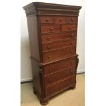 A modern mahogany chest on chest in the Georgian style, the moulded cornice above a blind fretwork