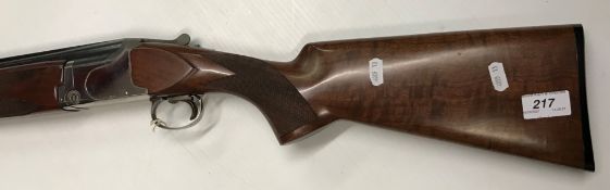 A Winchester Model 6500 Sporter 12 bore shotgun, over and under, 28" barrels (No. 542021)(Requires